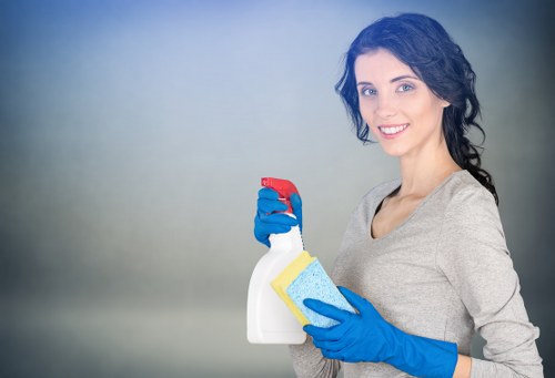 Local oven cleaner working in a compact Kennington flat kitchen